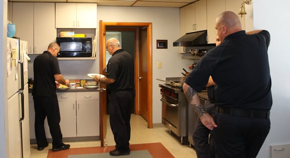 Concord Township fire fighters in the fire station kitchen