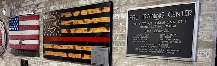 Oklahoma City Fire Department Fire Training Center plaque and flags on well